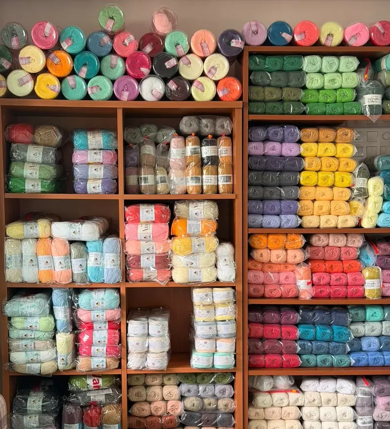 Shelves of yarn in every colour at the Creator's Hands craft room
